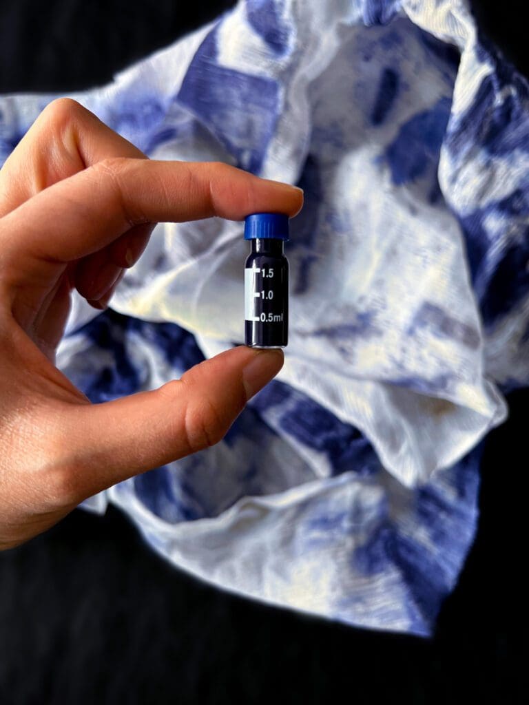 A vial of blue dye developed by Lite-1