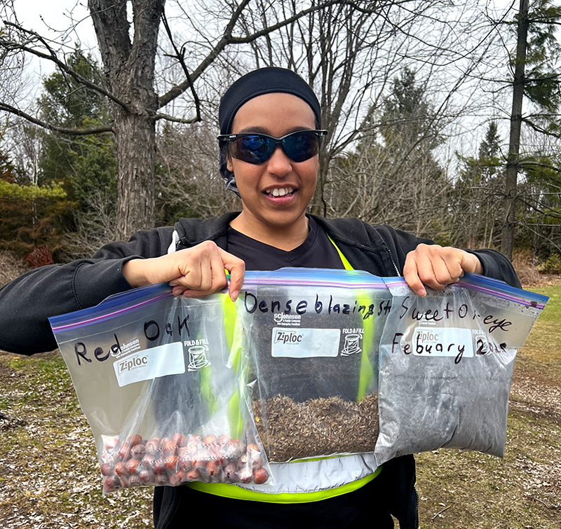 D’Amour Walker shows off the seeds she’s collected
